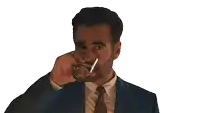 a man in a suit and tie is drinking a glass of water