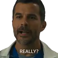 a man with a beard says " really " in front of his face