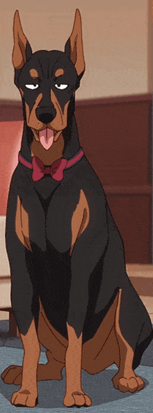 a brown and black dog with a red bow tie is sitting on the floor