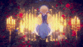 a girl in a blue dress is standing in a room with roses and candles .