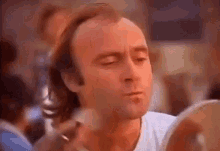 Kiss The Mirror GIF - Phil Collins Kiss Mirror GIFs