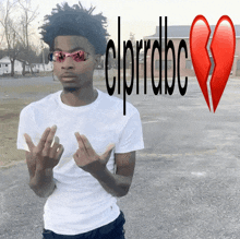a young man wearing sunglasses and a white shirt stands in front of a broken heart and the word cprrdbc