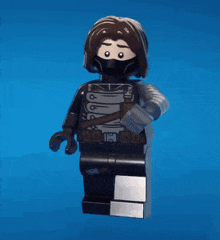 a lego figure of a man with a mask on