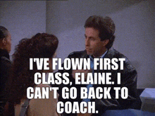 a man is talking to a woman and says i 've flown first class , elaine .