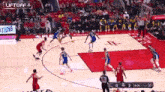 a basketball game is being played between the golden state warriors and the la lakers