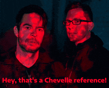 a man playing drums with the words " hey that 's a chevelle reference " below him