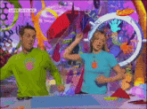 a man and a woman are dancing in front of a screen that says super at the top