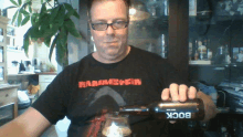 a man wearing a shirt that says ' hammerstein ' on it
