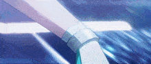 a close up of a person 's hand with a blue background