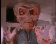 a close up of a cartoon character with a skull on his face