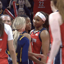 a female basketball player with the number 22 on her back