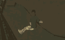 a person riding a skateboard in a video game with the letters r and l visible