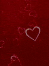 a pink circle with hearts around it that says care family kind