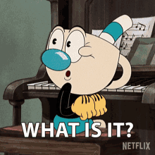 a cartoon character sitting at a piano with the words " what is it " written below him