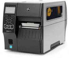 a zebra zt410 label printer is sitting on a white background