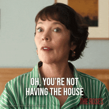 a woman in a green and white striped shirt says " oh you 're not having the house "
