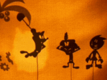 a shadow of a cartoon character with the letter v on his back