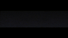 the word gay is on a black background with a yellow light