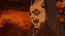 a man wearing glasses is holding a torch in front of a fire