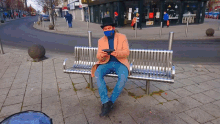 Playing Nintendo Top Hat Gaming Man GIF - Playing Nintendo Top Hat Gaming Man Sitting On A Bench And Playing Video Games GIFs