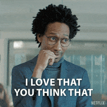 a man wearing glasses and a suit says i love that you think that