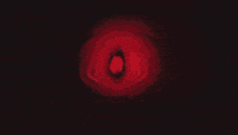 a red and black painting with the letter a in the middle