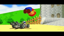 a video game where mario is flying through the air on a kart