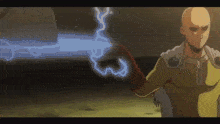 a bald man is standing in front of a blue lightning strike