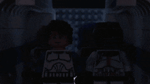 a group of lego figures are standing next to each other with one of them wearing a helmet that says dtf