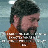a man with a beard is laughing because he knows exactly what his response would be to his text