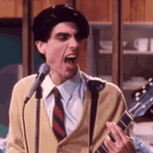 Brian Bell Weezer GIF - Brian Bell Weezer Tounge Out GIFs