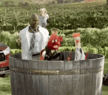 Terry Crews Muppets GIF - Terry Crews Muppets Making Wine GIFs