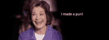 a woman is smiling and saying `` i made a pun '' .