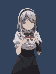 a girl with purple hair and a red bow tie is pointing to her chest