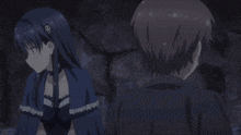a boy and a girl are standing next to each other and the girl is smiling