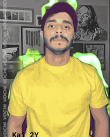 a man wearing a yellow shirt with kai 2y on the front