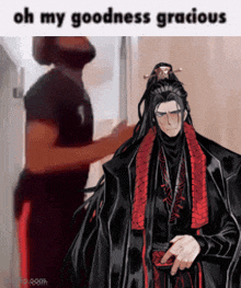 a man is standing next to a man in a black and red outfit and says oh my goodness gracious .