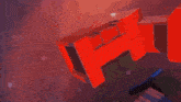 a close up of a red object with a white object in the middle