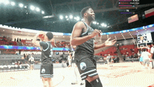 a basketball player with the number 2 on his jersey stands on the court