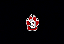 a red paw with a white letter s inside of it