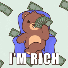 a teddy bear is sitting in a chair holding a fan of money and the words i 'm rich