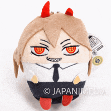 a stuffed toy with a tag that says japan media on it