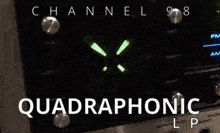 a picture of a radio with the words channel 98 quadrophenic on it