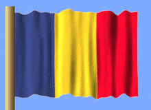 a blue yellow and red flag is waving in the wind against a blue sky