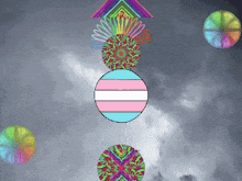 a transgender flag is in the middle of a circle with other circles
