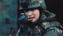 a woman in a military uniform has a patch on her shoulder that says korea