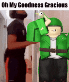 a man in a black shirt is standing next to a green roblox character with a duck on his head .
