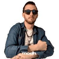 a man wearing sunglasses and a denim shirt has the word modh on the bottom