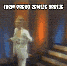 a blurred image of a woman with the words " idem preko zemlje srbije " written above her