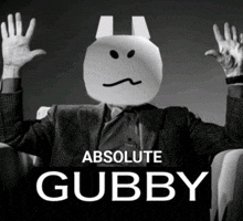 a black and white photo of a man with a paper face on his head and the words absolute gubby below him